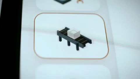 Selected conveyor tile carrying a white package Stock Photos