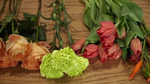 Selected flowers are on the table Stock Footage 94426951
