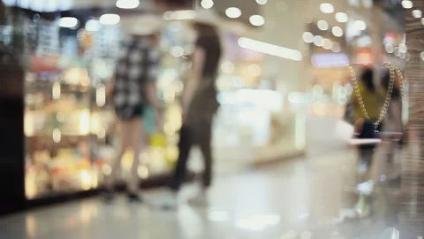 Selected Focus. Blurry Background with People Walking around the Mall Stock Footage 157208114