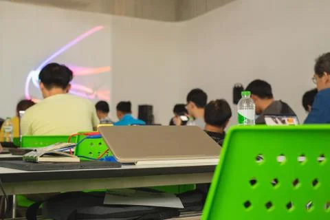 Selected focus on laptop with student study in classroom. Stock Photos