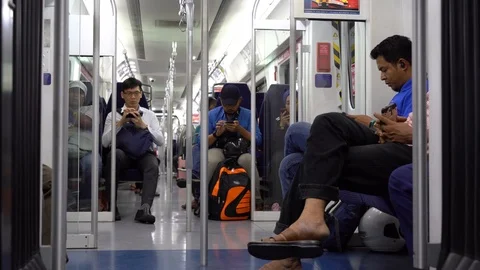 Selected focus on a man looking at the mobile phone Video stock 110970049