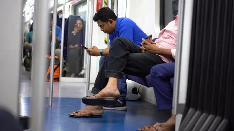 Selected focus on a man looking at the mobile phone Video stock 110973619