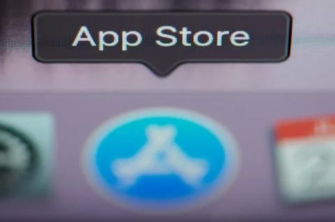Selecting app store application on computer Stock Photos