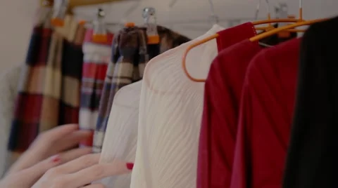 Selecting clothes Video stock 57303350