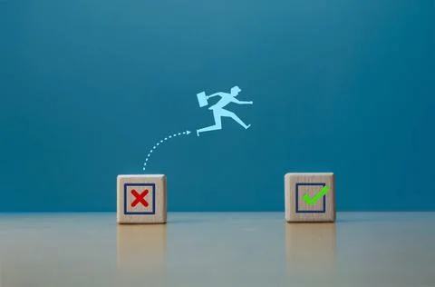 Selecting the correctness, a businessman jumps from the wrong icon to the c.. Stock Photos