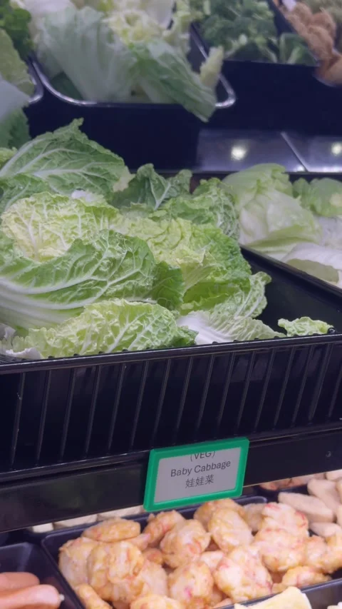 Selecting Hot Pot Ingredients at Buffet Counter Video stock 323493580