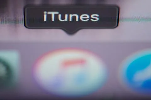 Selecting itunes application on computer Stock Photos