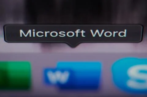 Selecting microsoft word application on computer 스톡 사진