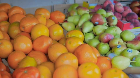 Selecting Oranges from a Local Grocery Shop Display Stock Footage 41511348