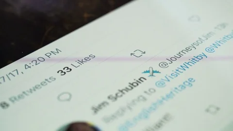 Selecting the retweet and like buttons in Twitter app. Stock Footage 81211040