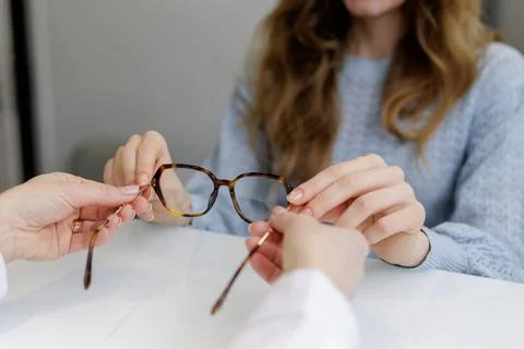 Selecting Stylish Glasses for Poor Vision in Optics Store Stock Photos