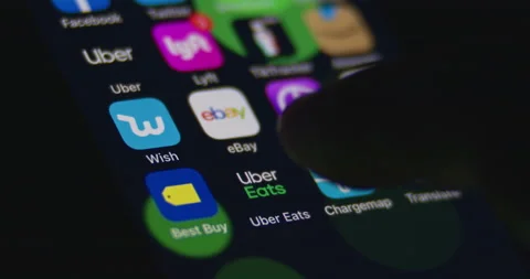 Selecting Uber Eats App on Smartphone. Open and scroll App. Stock Footage 149544988