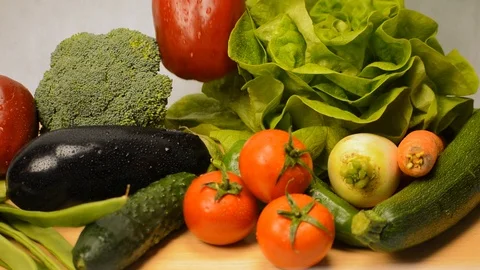 Selecting Vegetables From a Pile Stock Footage 88699170