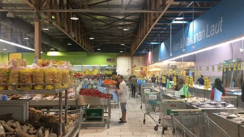 Selecting Vegetables While Grocery Shopping In Supermarket Stock Footage 125486450