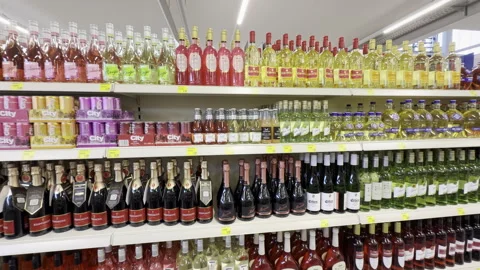 Selection of alcoholic beverages at the discount store called Philipps in Stock Footage 332973350