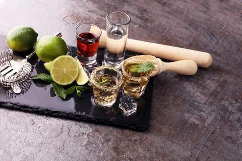 Selection of alcoholic drinks on rustic stone plate Stock Photos