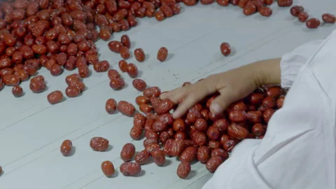 Selection and production of Xinjiang red dates Stock Footage 240975413