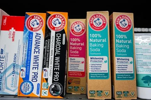 Selection of Arm &amp; Hammer baking soda and whitening toothpaste on display she Stock Photos