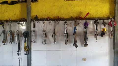 Selection of bike tools including spanners, wrench and screwdrivers Video stock 243191062