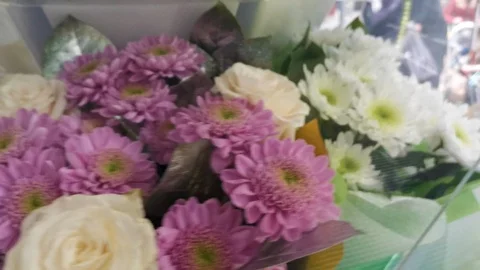 Selection of bouquets of flowers in the machine standing in the store  Stock Footage 120602448