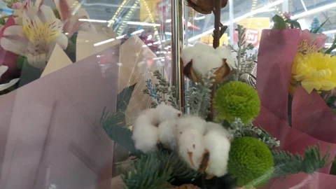 Selection of bouquets of flowers in the machine standing in the store  Stock Footage 120662543