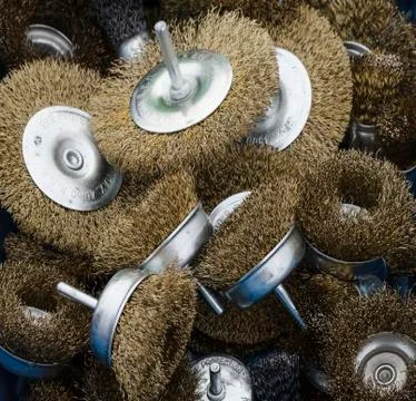A selection of brass wire brushes for use with a drill Stock Photos