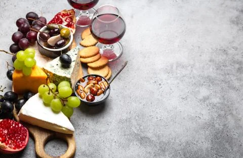 Selection of cheese and appetizers Stock Photos