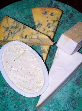 A Selection of Cheese on a Cheese Board Stock Photos