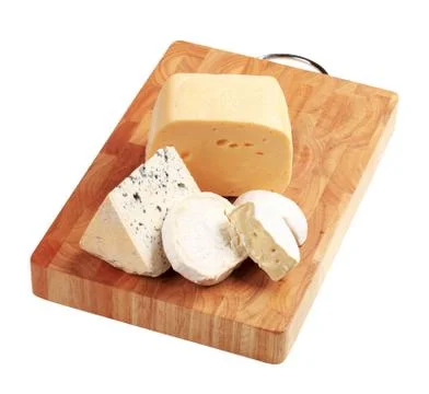 Selection of cheeses on a cutting board Stock Photos