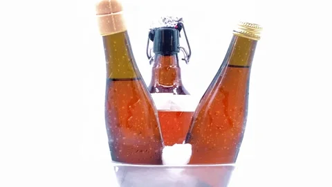 Selection of craft beer on white smoke cloud of dry ice swirling elegantly .. Stock Footage 310958870