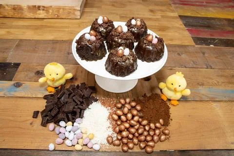 A selection of Easter Chocolate nest Cakes topped with three little chocola.. Stock Photos