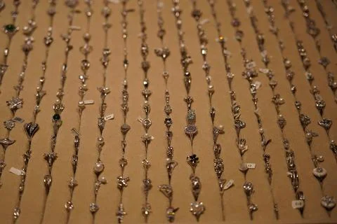 Selection of Elegant Silver Rings on Display Stock Photos