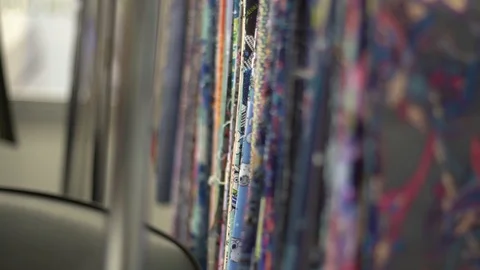 Selection of fabric from a wide range 2 Stock Footage 112013019