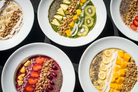 A selection of five different Smoothie bowl with different fruits, yogurt, Stock Photos