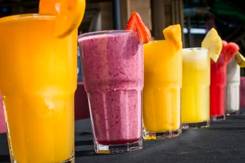 A selection of Fruit shakes displayed together in formation Stock Photos