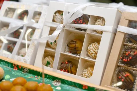 A selection of handmade chocolates in gift boxes Stock Photos