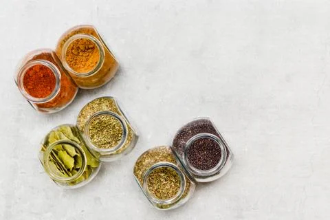 A selection of herbs and spices for adding flavour to food when  cooking on a Stock Photos