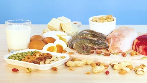 Selection of high protein foods displayed including fish poultry meat chees.. Stock Footage 333873873