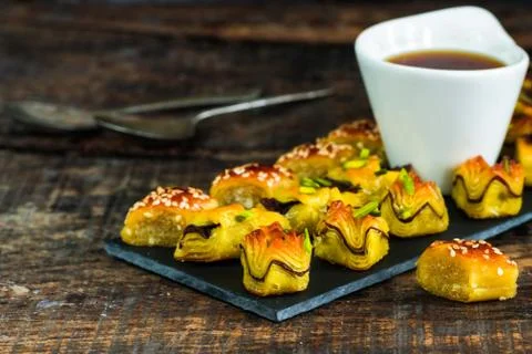 Selection of middle Eastern sweets with coffee Stock Photos