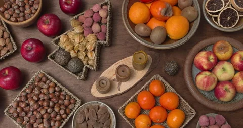 Selection of nuts and fruits on a table. Christmas time. Stock Footage 282801183