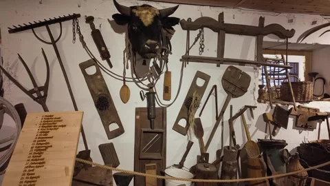 Selection of old 19th-20th century wooden kitchen and garden tools at the Eger Video stock 299256618