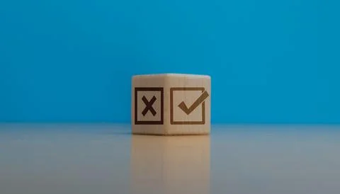 Selection or check, wrong and right marks on wooden blocks Stock Photos