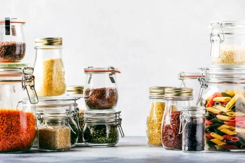 Selection or set of cereals, pasta, groats, organic legumes and useful seeds  Stock Photos