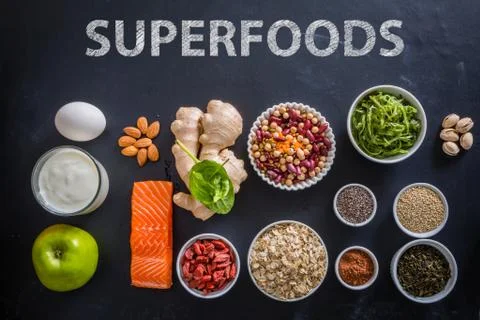 Selection of superfoods on rustic background Stock Photos