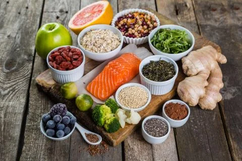 Selection of superfoods on rustic background Stock Photos