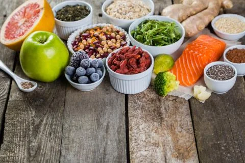 Selection of superfoods on rustic background Stock Photos