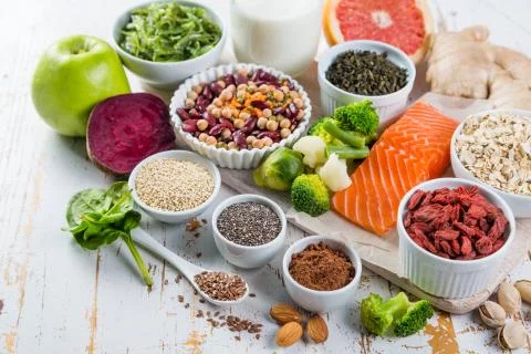 Selection of superfoods on rustic background Stock Photos