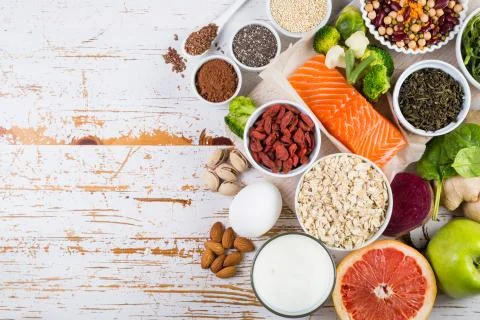 Selection of superfoods on rustic background Stock Photos