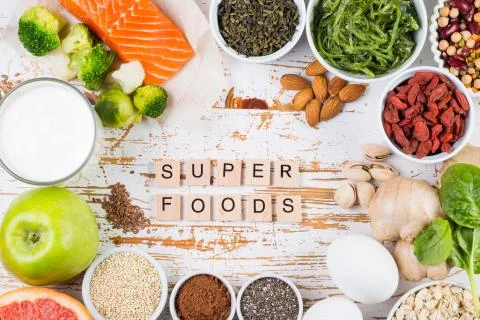 Selection of superfoods on rustic background Stock Photos