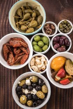 Selection of tapas in ceramic bowls Stock Photos